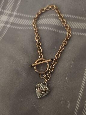Juicy Couture Gold Tone Heart Toggle Bracelet with Crystal Charm